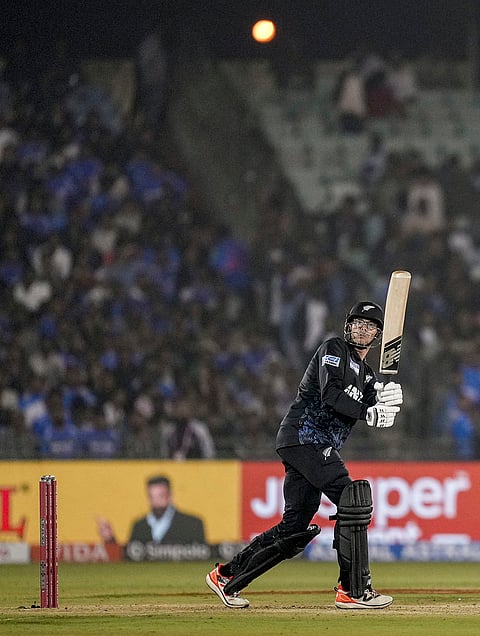 New Zealand's captain Mitchell Santner plays a shot during the second T20I cricket match between India and New Zealand, at Shaheed Veer Narayan Singh International Cricket Stadium, in Raipur, Chhattisgarh.
