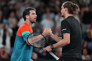 | Photo: AP/Aaron Favila : Alexander Zverev, right, of Germany is congratulated by Cameron Norrie, left, of Britain following their third round match at the Australian Open tennis championship in Melbourne, Australia.