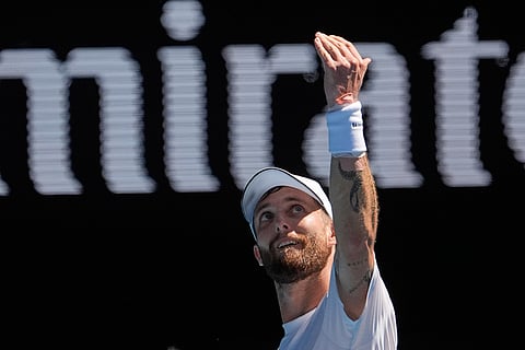 Corentin Moutet of France gestures during his third round match against Carlos Alcaraz of Spain at the Australian Open tennis championship in Melbourne, Australia.