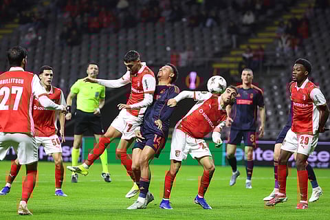 Nottingham Forest's Dan Ndoye, center, vies for the ball with Braga's Gabri Martinez, center left, and Ricardo Horta during the Europa League opening phase soccer match between SC Braga and Nottingham Forest in Braga, Portugal.