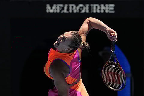 Aryna Sabalenka of Belarus serves to Anastasia Potapova of Austria during their third round match at the Australian Open tennis championship in Melbourne, Australia.