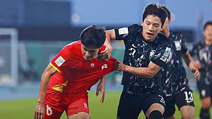 | Photo: Facebook/Vietnam Football Federation : Vietnam's Nguyen Thai Quoc Cuong in action against South Korea's Bae Hyun-Seo during their AFC U23 Asian Cup match on January 23, 2026.