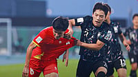 | Photo: Facebook/Vietnam Football Federation : Vietnam's Nguyen Thai Quoc Cuong in action against South Korea's Bae Hyun-Seo during their AFC U23 Asian Cup match on January 23, 2026.