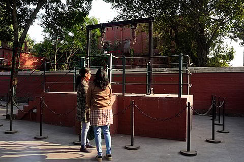 The image shows the gallows area at the Alipore Jail Museum in Kolkata.