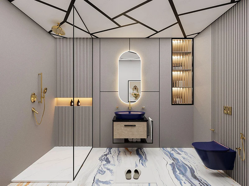Modern bathroom with blue basin, toilet, gold fixtures, and a marble floor