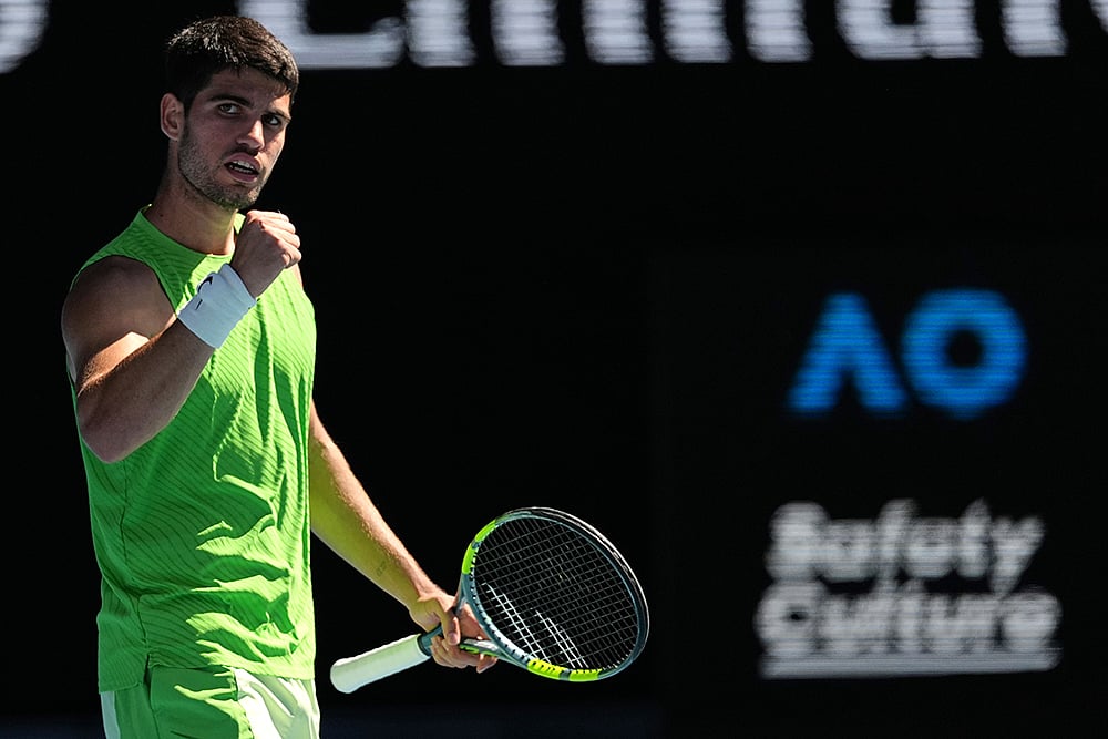 Carlos Alcaraz of Spain reacts after defeating Corentin Moutet of France in their third round match at the Australian Open tennis championship in Melbourne, Australia. - | Photo: AP/Asanka Brendon Ratnayake