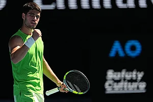 | Photo: AP/Asanka Brendon Ratnayake : Carlos Alcaraz of Spain reacts after defeating Corentin Moutet of France in their third round match at the Australian Open tennis championship in Melbourne, Australia.