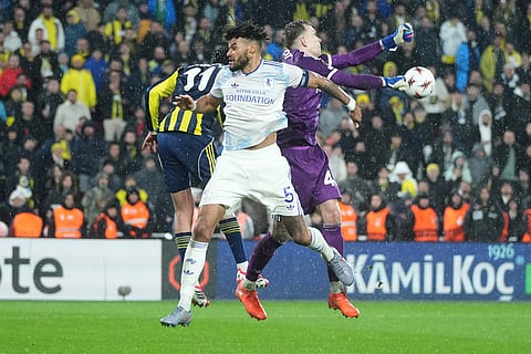 Aston Villa's goalkeeper Marco Bizot, right, makes a save during a Europa League opening phase soccer match between Fenerbahce and Aston Villa, in Istanbul, Turkey.