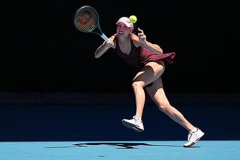 Anastasia Potapova of Austria plays a forehand return to Aryna Sabalenka of Belarus during their third round match at the Australian Open tennis championship in Melbourne, Australia.