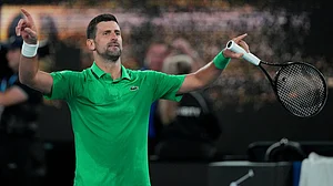 Photo: AP : Novak Djokovic of Serbia reacts after defeating Botic van de Zandschulp of the Netherlands in their third round match at the Australian Open tennis championship in Melbourne.