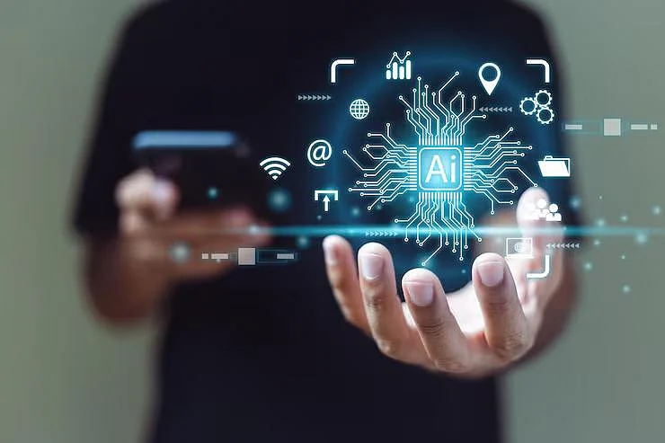 Person holding interactive AI circuit board graphic