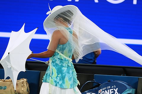 Naomi Osaka of Japan walks onto Rod Laver Arena for her first round match against Antonia Ruzic of Croatia at the Australian Open tennis championship in Melbourne, Australia, Tuesday, Jan. 20, 2026. 