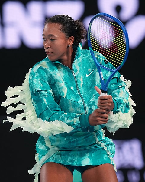 Naomi Osaka of Japan reacts ahead of her first round match against Antonia Ruzic of Croatia at the Australian Open tennis championship in Melbourne, Australia.