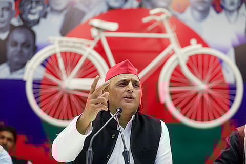 Samajwadi Party President Akhilesh Yadav addresses a press conference at the party office, in Lucknow.