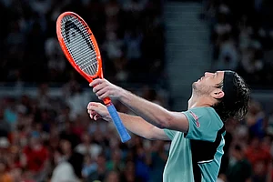 | Photo: AP/Asanka Brendon Ratnayake : Taylor Fritz of the U.S. reacts after defeating Stan Wawrinka of Switzerland during their third round match at the Australian Open tennis championship in Melbourne, Australia.