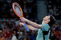 Australian Open 2026: Swiss Ace Bows Out In Third Round With Defeat | Photo: AP/Asanka Brendon Ratnayake : Taylor Fritz of the U.S. reacts after defeating Stan Wawrinka of Switzerland during their third round match at the Australian Open tennis championship in Melbourne, Australia.