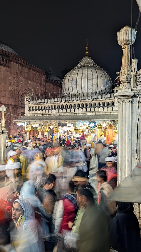 Yesterday, the dargah's courtyard and lanes transformed into a living tapestry of yellow chadars draped over the tomb, marigold and mustard flowers everywhere, devotees in saffron hues singing and offering prayers.