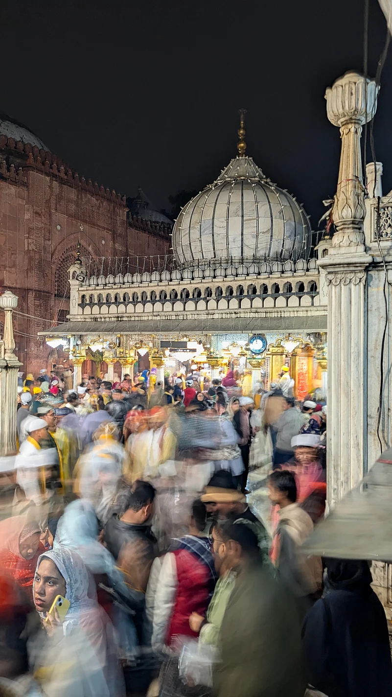 Yesterday, the dargahs courtyard and lanes transformed into a living tapestry of yellow chadars draped over the tomb, marigold and mustard flowers everywhere, devotees in saffron hues singing and offering prayers.