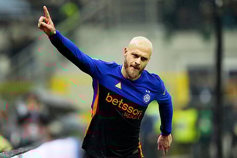 Inter Milan's Federico Dimarco celebrates after scoring his side's fourth goal during a Serie A soccer match between Inter Milan and Pisa, in Milan, Italy.