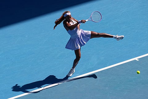 Coco Gauff of the U.S. plays a forehand return to Karolina Muchova of the Czech Republic during their fourth round match at the Australian Open tennis championship in Melbourne, Australia.