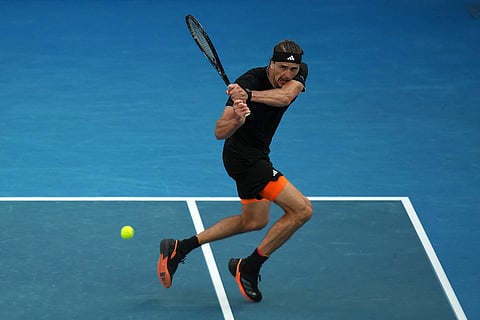 Alexander Zverev of Germany plays a backhand return to Francisco Cerundolo of Argentina during their fourth round match at the Australian Open tennis championship in Melbourne, Australia.