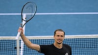 Photo: AP : Alexander Zverev of Germany celebrates after defeating Francisco Cerundolo of Argentina in their fourth round match at the Australian Open tennis championship in Melbourne.