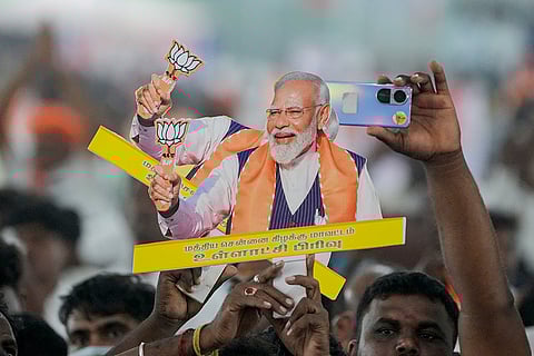 People attend a rally of Prime Minister Narendra Modi organised to launch NDA's campaign for the upcoming Assembly election in Tamil Nadu, at Maduranthakam in Chengalpattu district, Tamil Nadu.