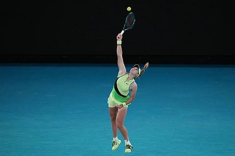 Mirra Andreeva of Russia serves to Elina Svitolina of Ukraine during their fourth round match at the Australian Open tennis championship in Melbourne, Australia.