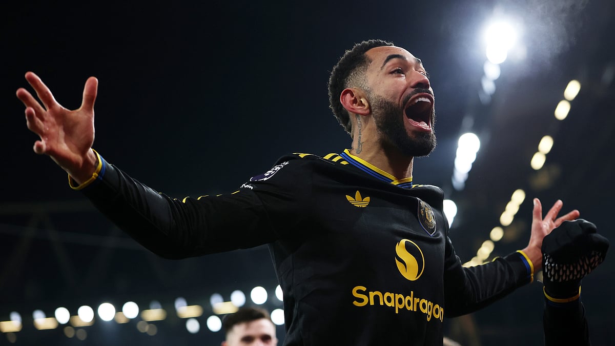 Matheus Cunha celebrates after scoring against Arsenal. - null