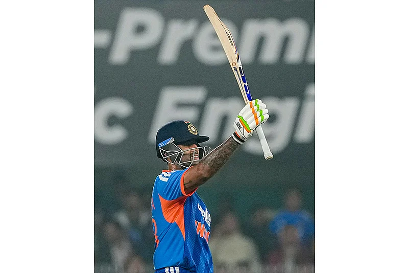 Indias captain Suryakumar Yadav celebrates his half century during the third T20I cricket match between India and New Zealand, at ACA Stadium, Barsapara in Guwahati.