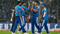 | Photo: AP/Mahesh Kumar A. : India's Axar Patel, second left, celebrates with teammates after the dismissal of New Zealand's Glenn Phillips during the first T20 cricket match between India and New Zealand in Nagpur, India, Wednesday, Jan. 21, 2026. 