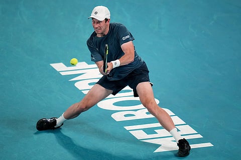 Botic van de Zandschulp of the Netherlands plays a backhand return to Novak Djokovic of Serbia during their third round match at the Australian Open tennis championship in Melbourne, Australia.