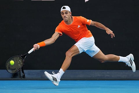 Francisco Cerundolo of Argentina plays a forehand return to Alexander Zverev of Germany during their fourth round match at the Australian Open tennis championship in Melbourne, Australia.