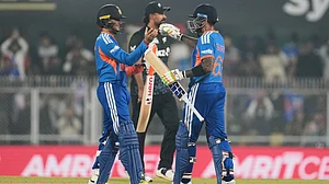 | Photo: AP/Anupam Nath : India's captain Suryakumar Yadav, right, greets India's Abhishek Sharma as he scores fifty run during the third T20 cricket match between India and New Zealand in Guwahati, India, Sunday, Jan. 25, 2026.
