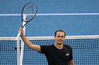 | Photo: AP/Dar Yasin : Alexander Zverev of Germany celebrates after defeating Francisco Cerundolo of Argentina in their fourth round match at the Australian Open tennis championship in Melbourne, Australia.