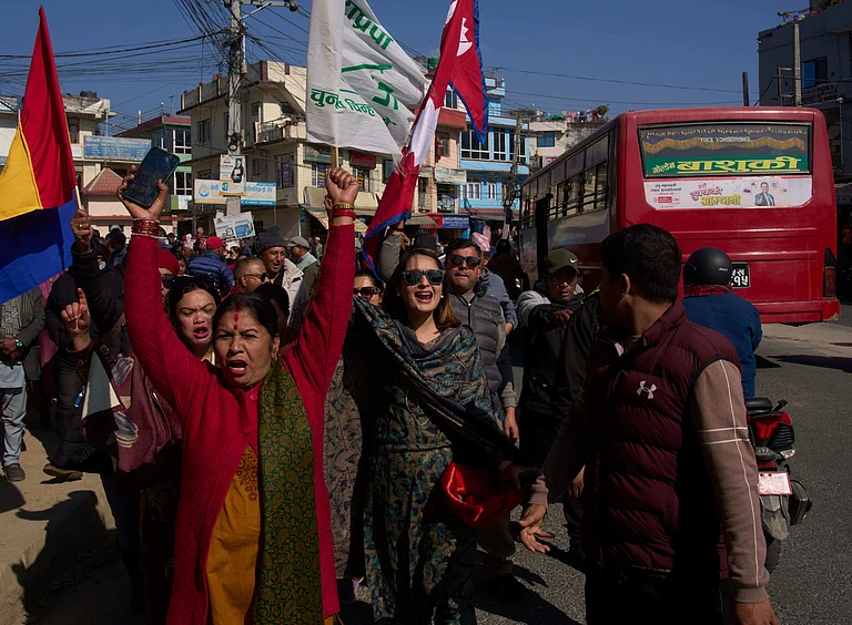 Supporter of Rastriya Prajatantra party gather to go to the election office to register their leader's candidacy for the general election to be held on March 5 in Kathmandu, Nepal, Tuesday, Jan. 20, 2026. - (AP Photo/Niranjan Shrestha)
