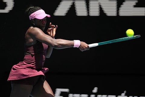 Victoria Mboko of Canada plays a forehand return to Aryna Sabalenka of Belarus during their fourth round match at the Australian Open tennis championship in Melbourne, Australia.