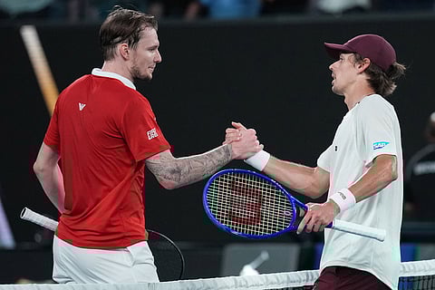 Alex de Minaur, right, of Australia is congratulated by Alexander Bublik, left, of Kazakhstan in following fourth round match at the Australian Open tennis championship in Melbourne, Australia.
