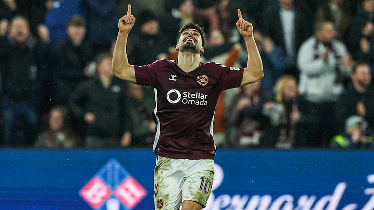 Claudio Braga celebrates after scoring for Hearts during the Scottish Premiership match against Celtic on January 25, 2026. - null