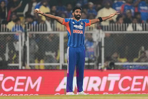 India's Jasprit Bumrah celebrates the dismissal of New Zealand's captain Mitchell Santner during the third T20 cricket match between India and New Zealand in Guwahati, India.