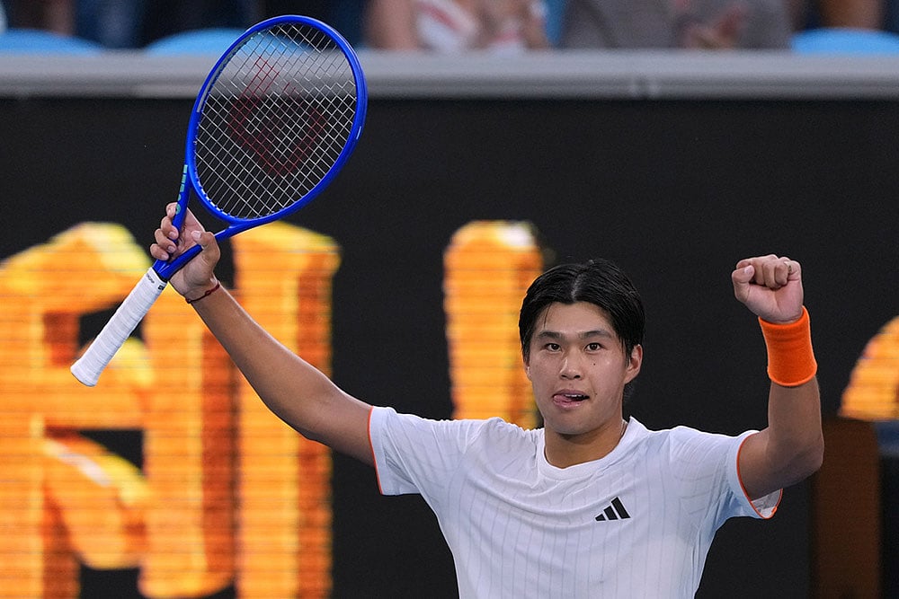 Learner Tien of the U.S. celebrates after defeating Daniil Medvedev of Russia in their fourth round match at the Australian Open tennis championship in Melbourne, Australia. - | Photo: AP/Asanka Brendon Ratnayake