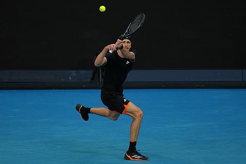 Alexander Zverev of Germany plays a backhand return to Francisco Cerundolo of Argentina during their fourth round match at the Australian Open tennis championship in Melbourne, Australia.