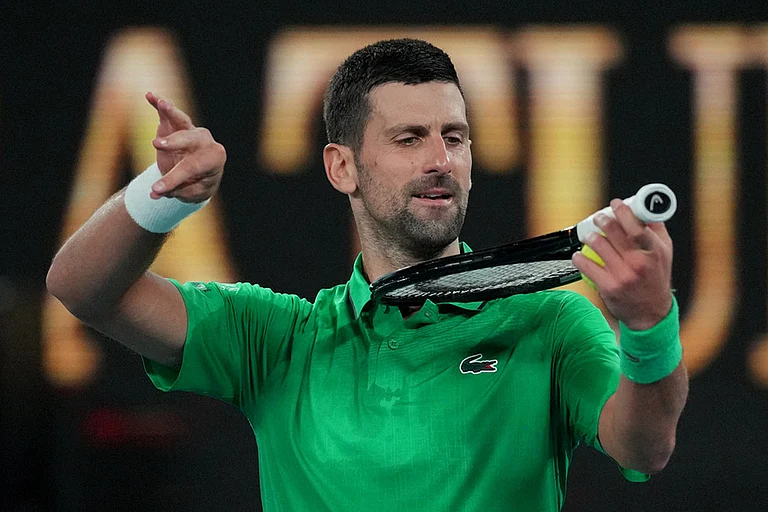 Novak Djokovic of Serbia reacts after defeating Botic van de Zandschulp of the Netherlands in their third round match at the Australian Open tennis championship in Melbourne, Australia. - | Photo: AP/Dita Alangkara