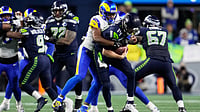 Seahawks Progress To Super Bowl With Thrilling 31-27 Win Over Rams In NFC Title Clash AP : Seattle Seahawks quarterback Sam Darnold (14) is sacked by Los Angeles Rams safety Kamren Kinchens during the second half of the NFC Championship NFL football game.