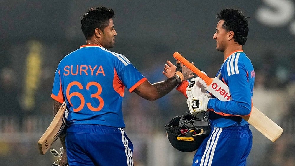India's captain Suryakumar Yadav, left, and India's Abhishek Sharma celebrate after winning the third T20 cricket match between India and New Zealand in Guwahati, India. - Photo: AP/Anupam Nath