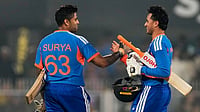 Photo: AP/Anupam Nath : India's captain Suryakumar Yadav, left, and India's Abhishek Sharma celebrate after winning the third T20 cricket match between India and New Zealand in Guwahati, India.
