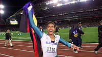 Olympic 400m Champion And Indigenous Campaigner Cathy Freeman Receives Australia's Highest Honour (AP Photo/Thomas Kienzle, File) : In this Sept. 25, 2000, file photo, Australia's Cathy Freeman celebrates winning the women's 400 meter race at the Summer Olympics at Olympic Stadium in Sydney.