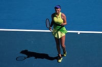 | Photo: AP/Aaron Favila : Amanda Anisimova of the U.S. celebrates after defeating Wang Xinyu of China during their fourth round match at the Australian Open tennis championship in Melbourne, Australia.