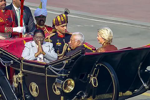 President Droupadi Murmu arrives with European Commission President Ursula von der Leyen and European Council President Antonio Costa during the 77th Republic Parade, at Kartavya Path, in New Delhi. 