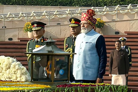
Prime Minister Narendra Modi, Chief of Defence Staff (CDS) General Anil Chauhan and Chief of the Army Staff (COAS) General Upendra Dwivedi pay tribute at the National War Memorial on the occasion of the 77th Republic Day, in New Delhi. 